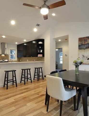 kitchen/dining room with hardwood floor Peoples Signature Flooring Austin Texas