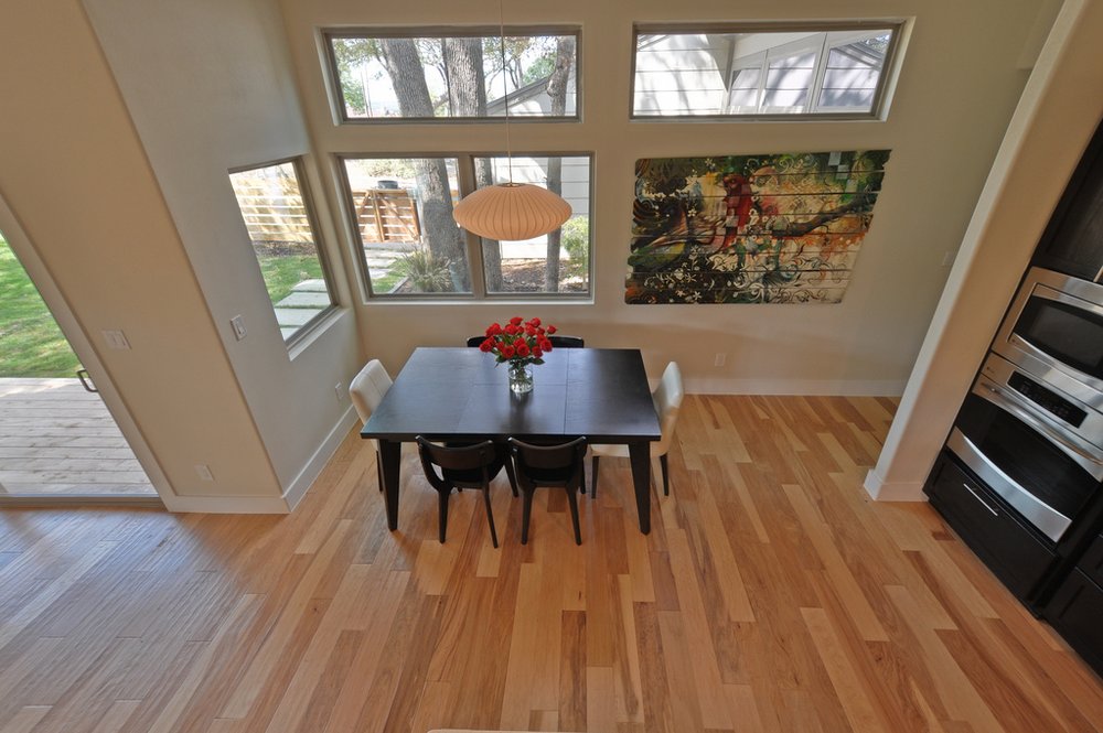 dining room with hardwood floor Peoples Signature Flooring Austin Texas