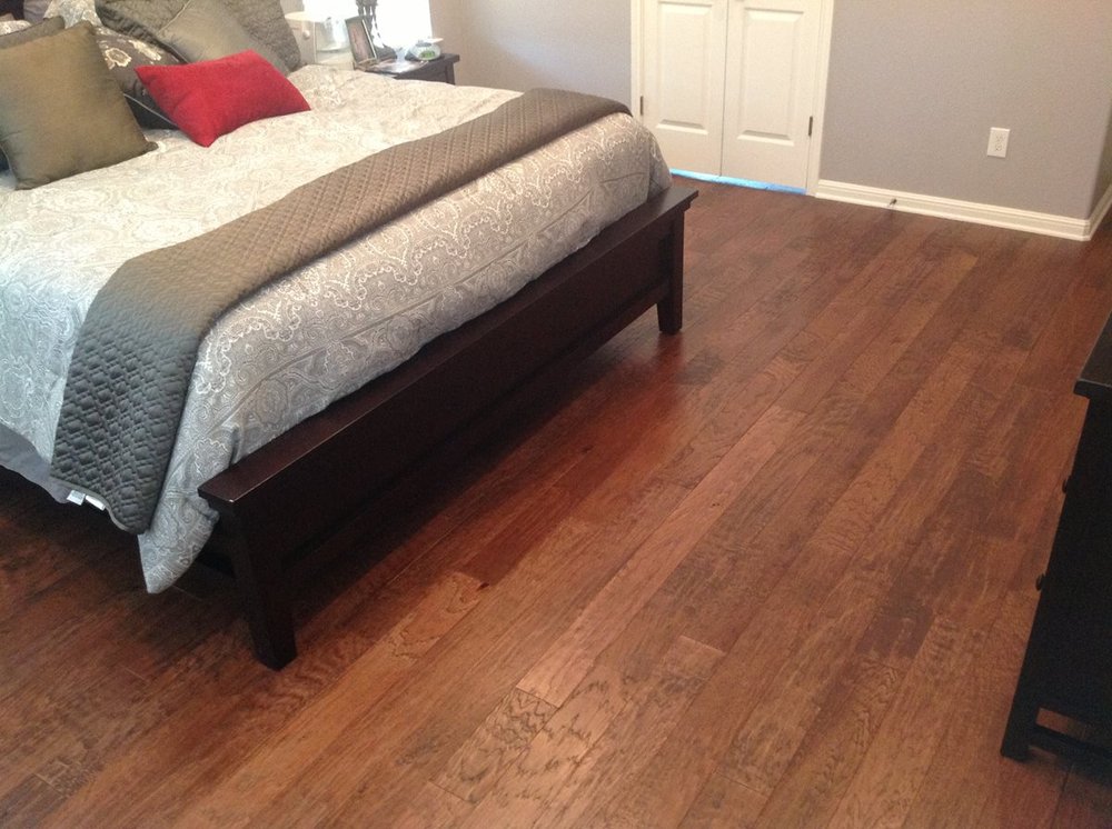 bedroom with hardwood floor Peoples Signature Flooring Austin Texas