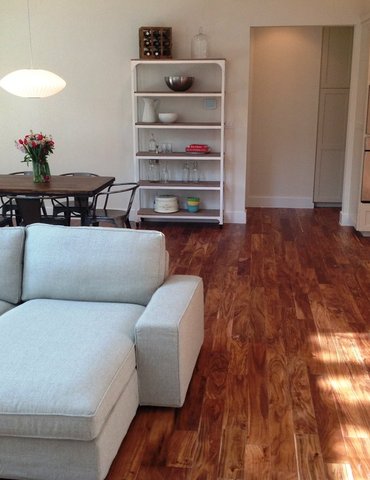 living room with hardwood floor Peoples Signature Flooring Austin Texas