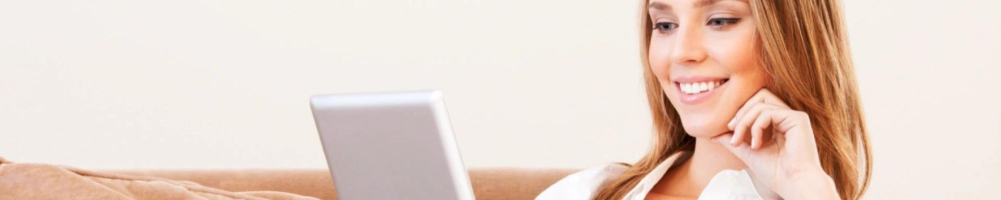 woman-on-tablet-banner-2000x400